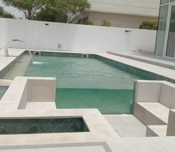 Custom swimming pool design featuring modern elements and unique features